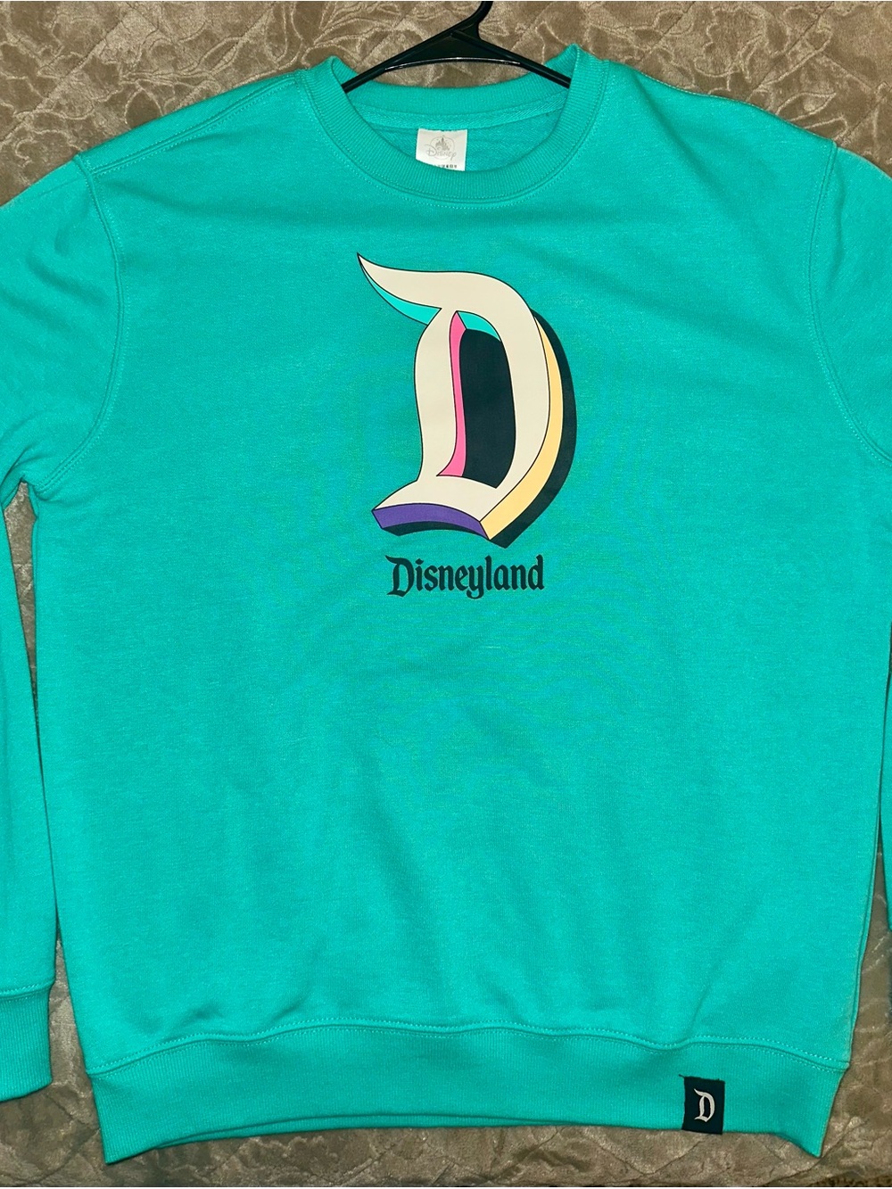 Disney Women’s Teal Disneyland Sweatshirt NWT